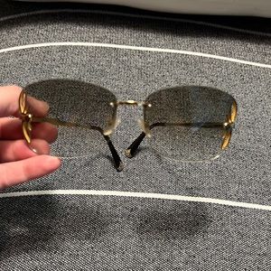 Louie Vuitton sunglasses gold lily 2010